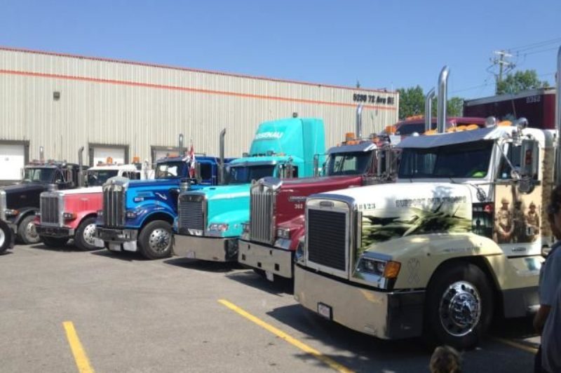 Trucks that took part in the convoy gathered in a NE Calgary parking lot, where drivers gathered to reflect on the loss of their friend Wes Brooks.