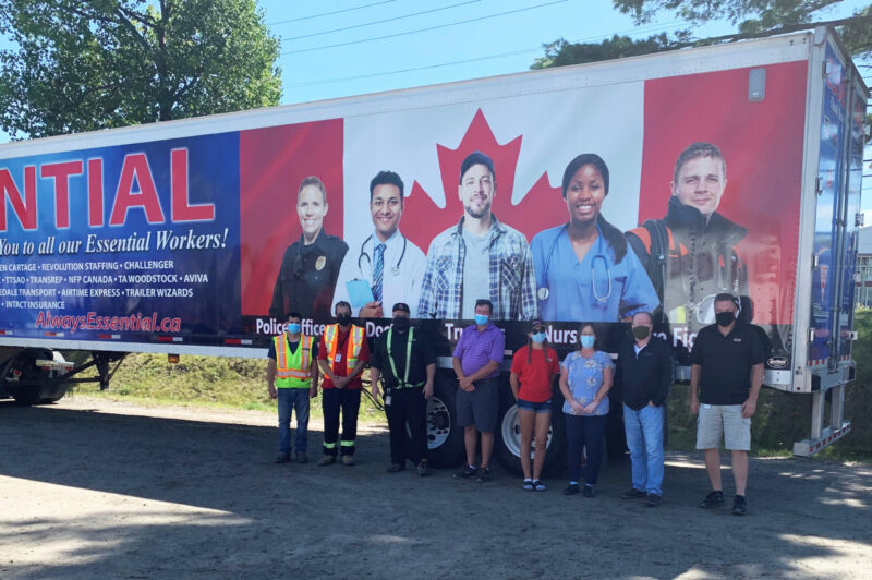Essential workers pictured with Essential Trailer