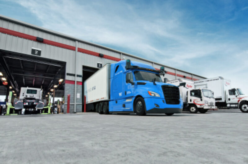 Waymo trucks at Ryder facility