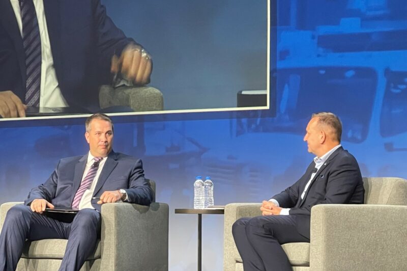 Erik Neandross of Gladstein, Neandross and Associates, talks electric vehicles with Volvo's Peter Voorhoeve