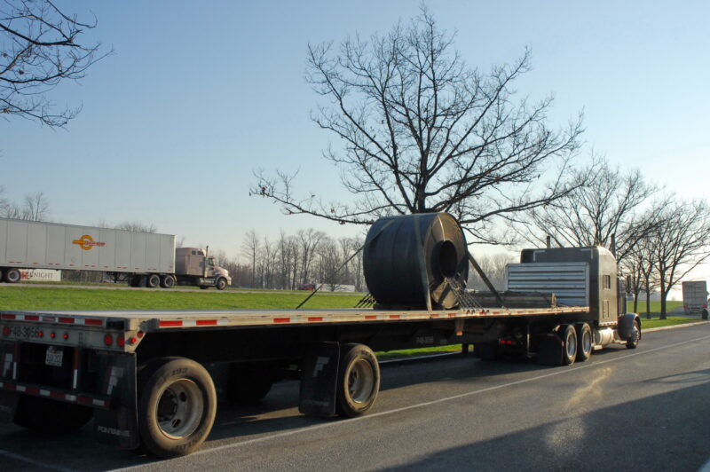 coiled steel on open deck trailer