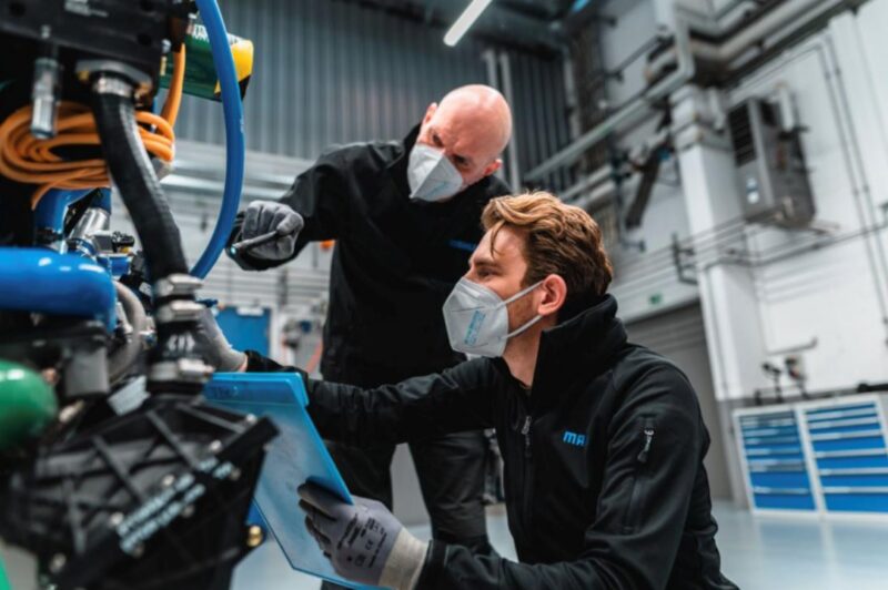 Mahle engineers working on Ballard fuel cell