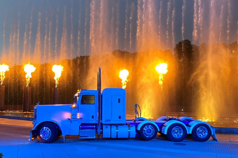 Truck parked in front of a fountain during Shell Rotella SuperRigs 2022
