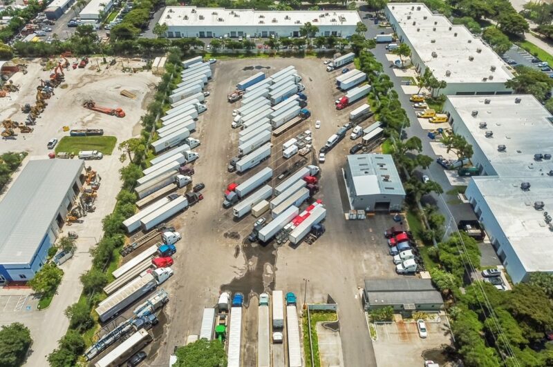 Overhead picture of trucks parked at a truck stop.