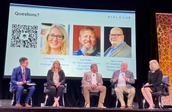 People sitting and talking on a stage