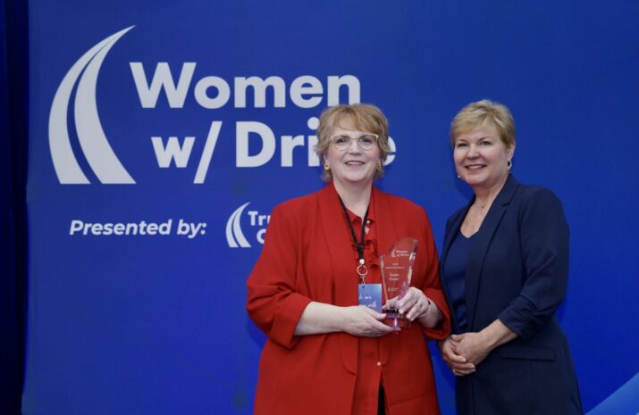 Susan Ewart photo with Angela Splinter and an award