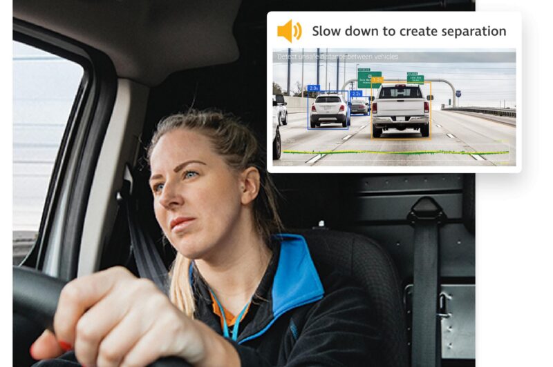 Female truck driver behind the wheel