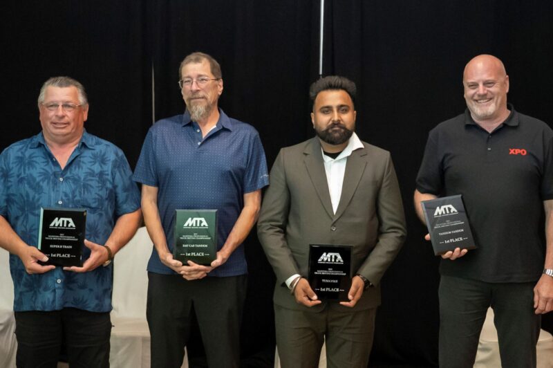 Picture of men with awards