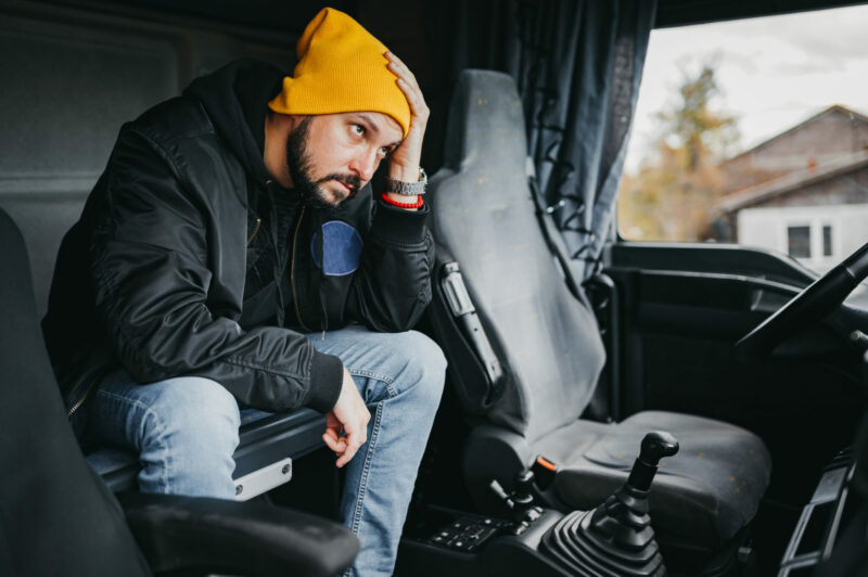 Picture of a sad truck driver