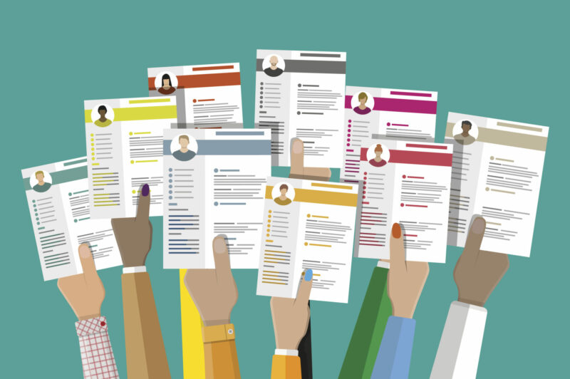 Illustration of people holding up resumes