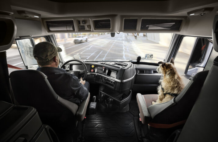 Volvo Driver and his pet in the cab
