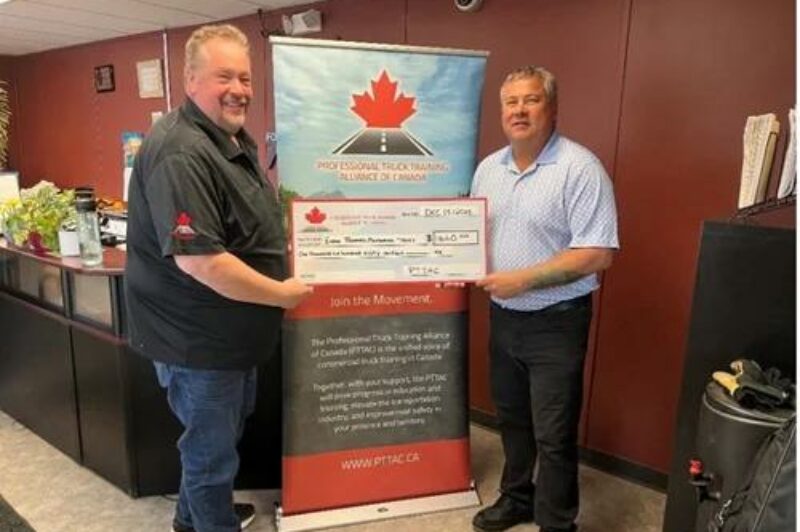 PTTAC presenting a cheque to Evan Thomas Memorial Fund