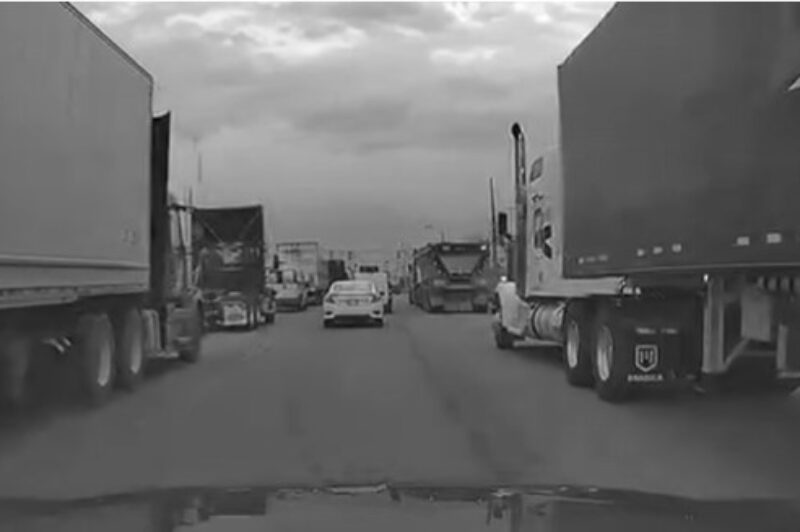 A road congested with trucks